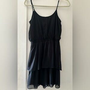 Cute black knee length spaghetti strap dress. Size ce